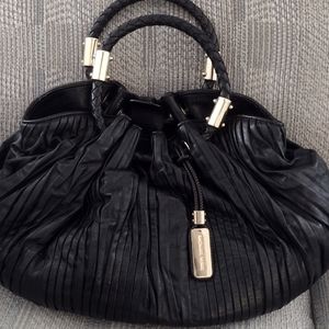 Michael kors Scorpios ring tote designer bag in black leather.